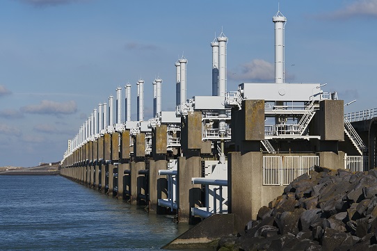 Closeup view of storm barriers placed near the stones and the water